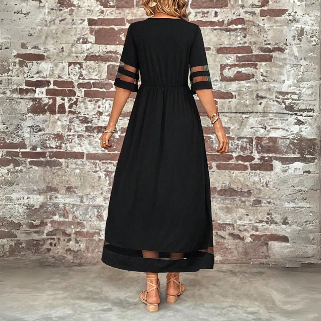 Robe midi élégante Danoir Paris Aubrée, coupe flatteuse, tissu fluide, portée pour une allure sophistiquée.