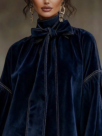 Robe courte en velours bleu Tiphaine de Danoir Paris, avec nœud à la taille, pour femme, vue de face.