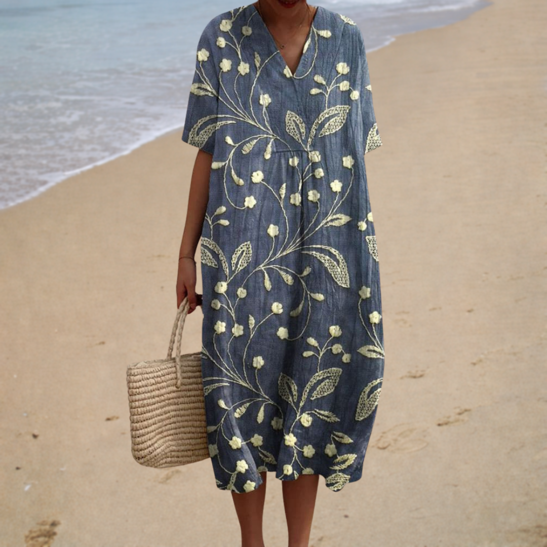 Robe midi bohème Élora de Danoir Paris, robe élégante avec motifs floraux, idéale pour un style décontracté et féminin.