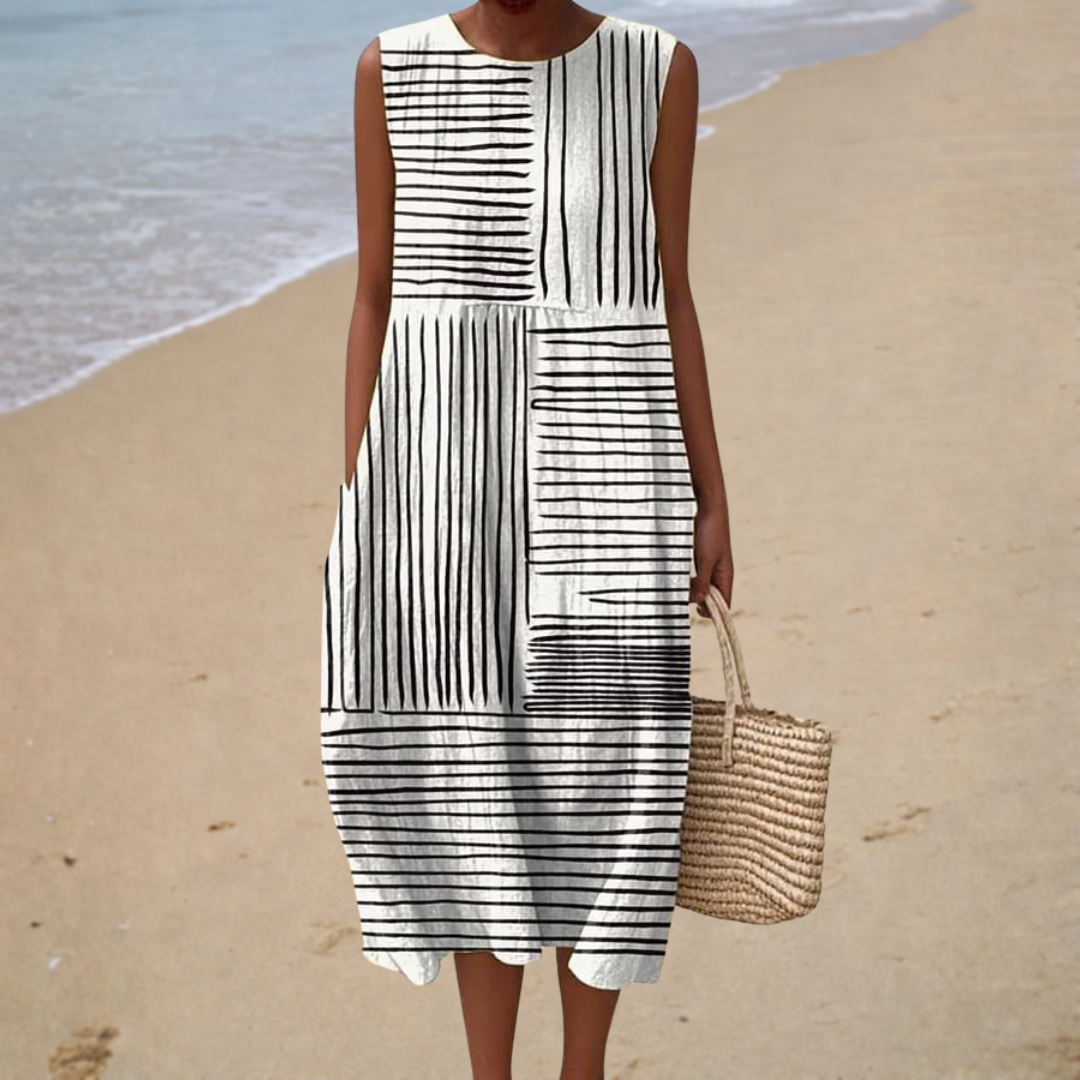Robe midi graphique Mathilde de Danoir Paris, robe longue élégante avec motif moderne, portée en image.