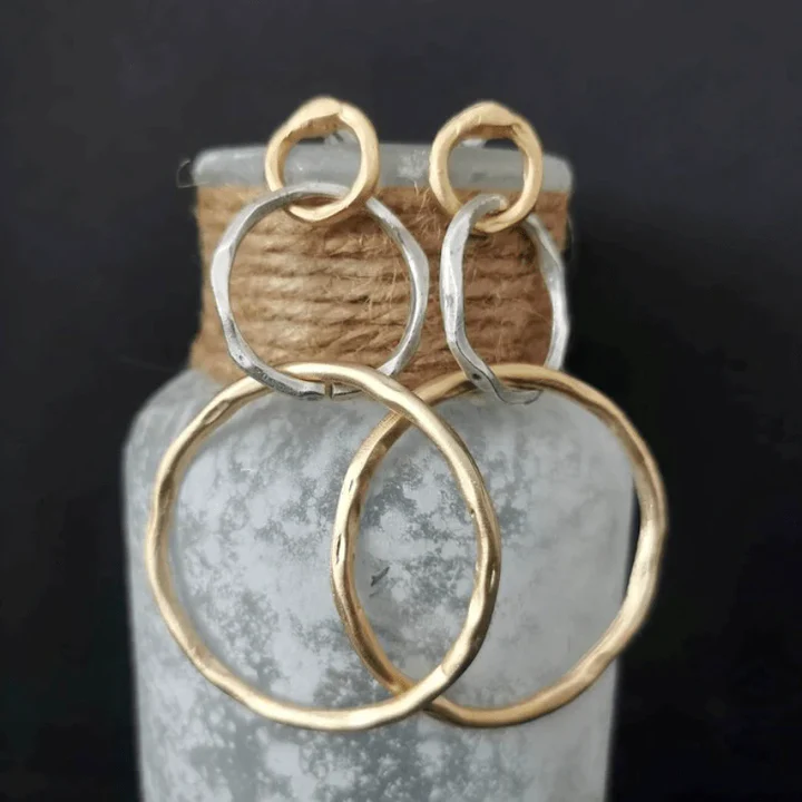 Boucles d'Oreilles vintage Danoir Paris en or et argent avec détails élégants et motifs rétro.