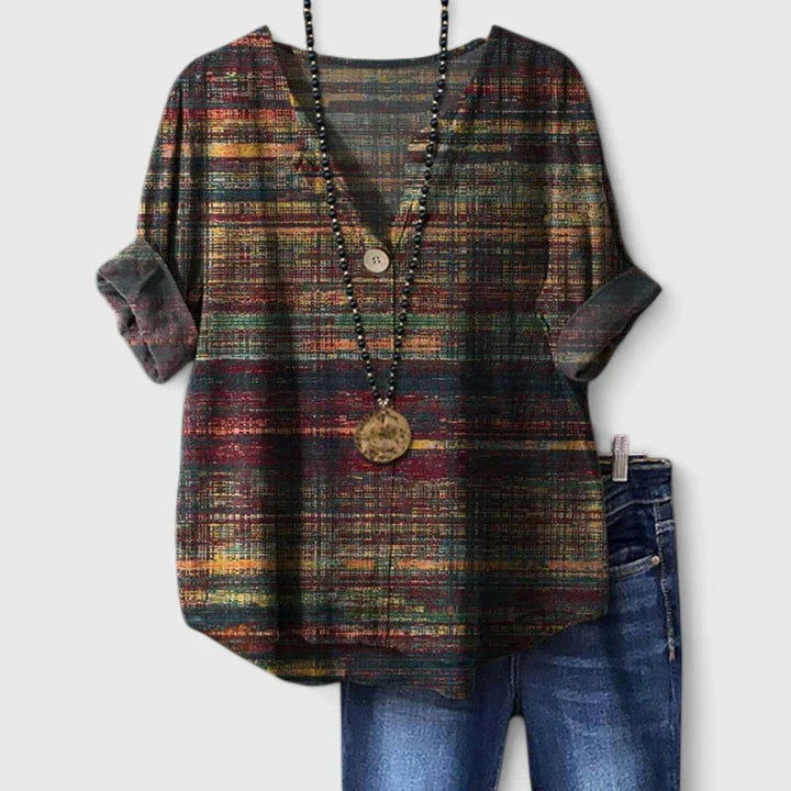 Blouse imprimée Kristina de Danoir Paris, élégante, multicolore, en tissu léger, portée décontractée.