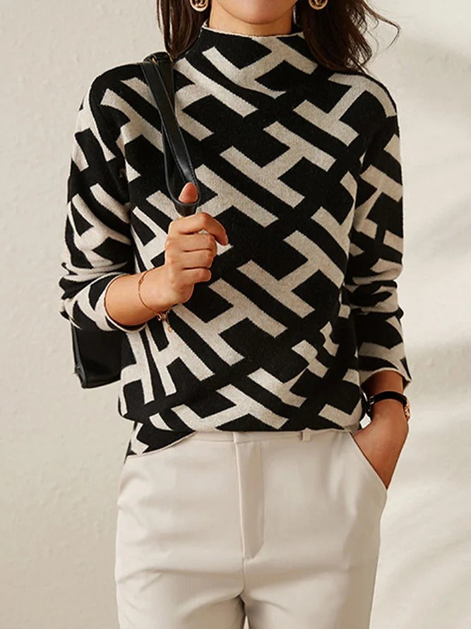 Pull roulé élégant Jessy de Danoir Paris, luxe et sophistiqué, en tissu doux avec détails raffinés visible sur l'image.