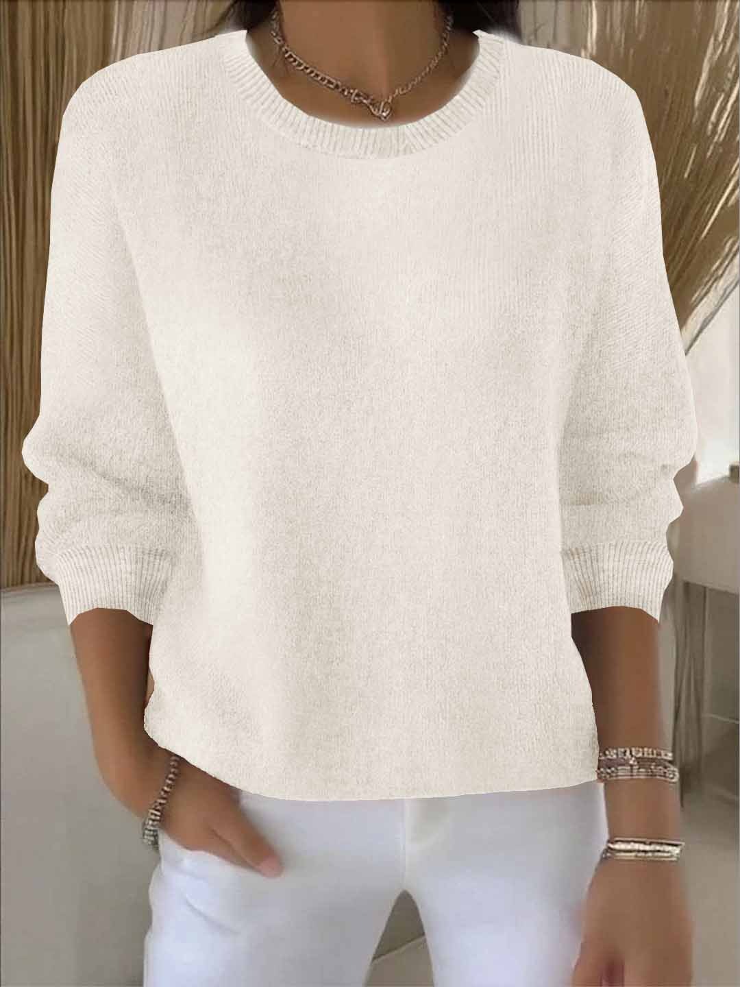 Pull élégant et confortable Danoir Paris Ely, style féminin et doux, porté par une femme dans une tenue décontractée.