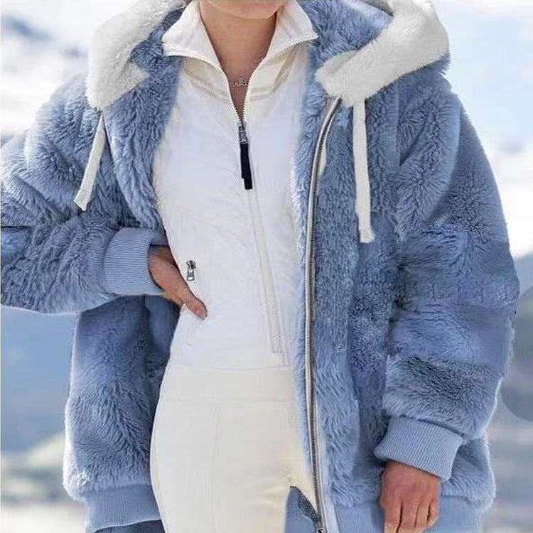 Veste d'hiver élégante Valorine de Danoir Paris avec rayures bleues, coupe sophistiquée, tissu chaud et confortable.
