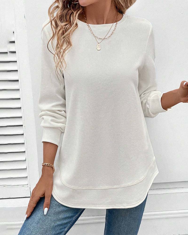 Haut doux à manches longues Alisa de Danoir Paris, blanc, en tissu confortable, pour femmes élégantes.