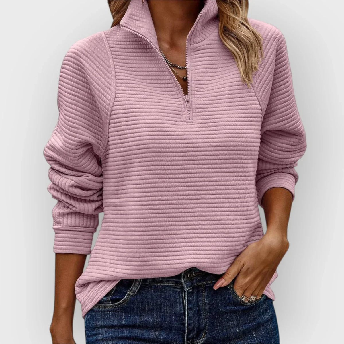 Pull chic et confortable Olivia de Danoir Paris en rose, tissu doux et style élégant pour un look tendance.