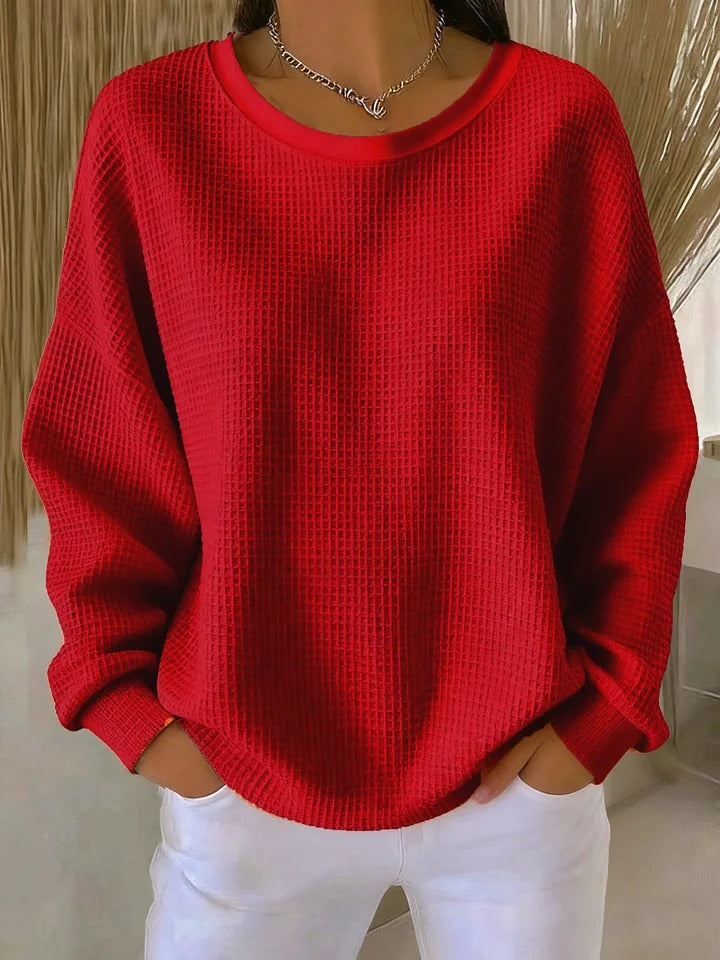 Pull Luna Danoir Paris en rose, élégant et confortable, avec un design tendance et une matière douce visible sur l'image.
