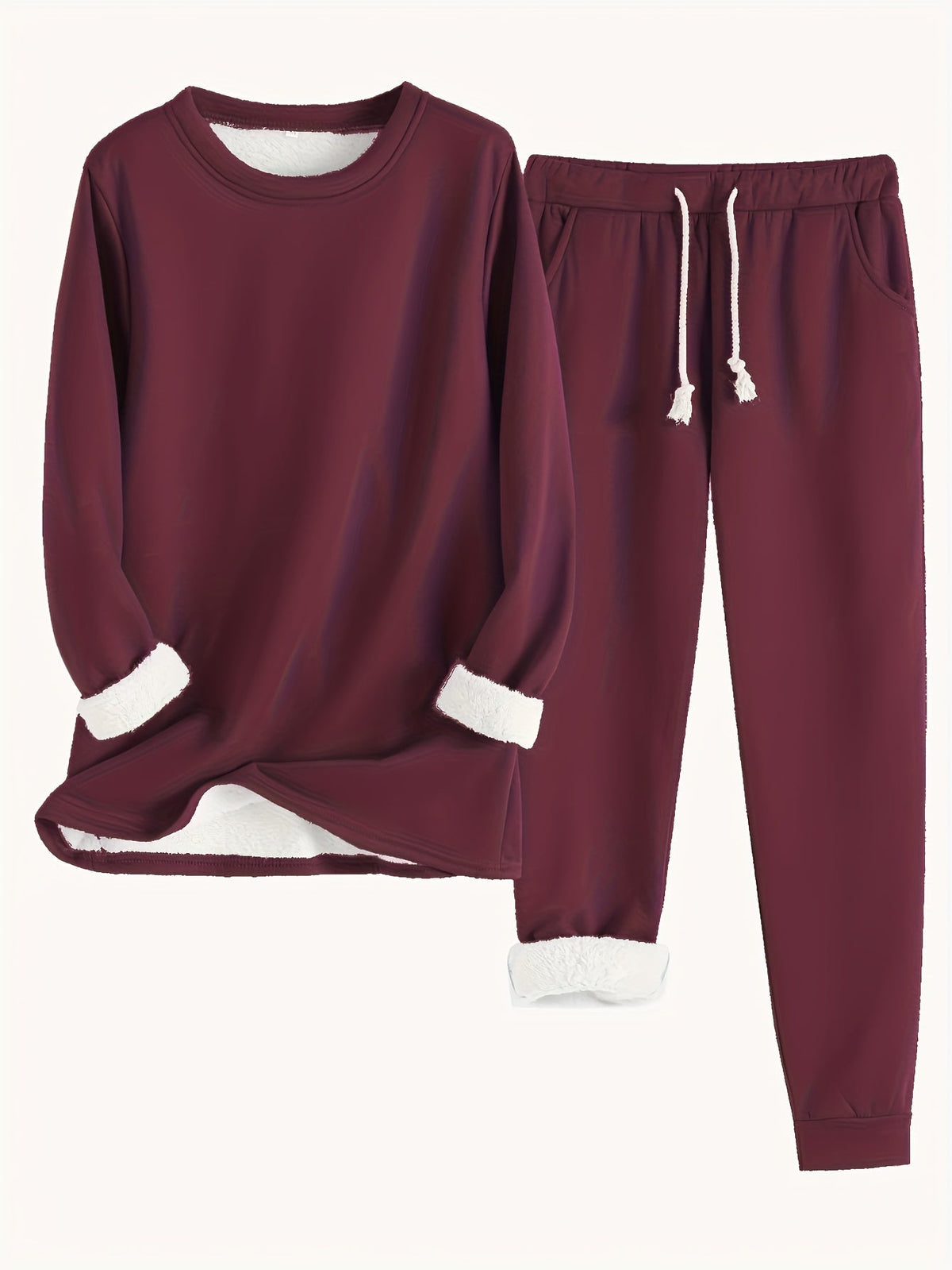 Ensemble détente élégant Karina de Danoir Paris en tissu bleu, veste et pantalon confortables, idéal pour la relaxation.