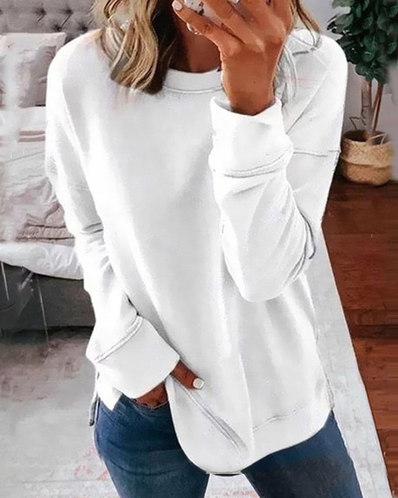 Pull Confort Chic Arabelle de Danoir Paris, vêtement en maille doux avec col rond et manches longues, couleur neutre.