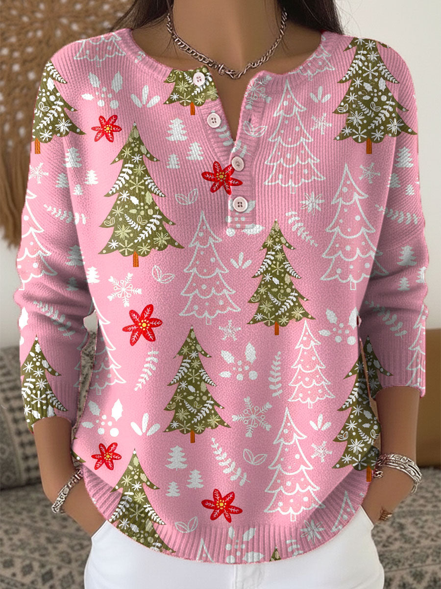 Pull de Noël festif Sofie de Danoir Paris, en laine rouge avec motifs de Noël, porté sur mannequin.