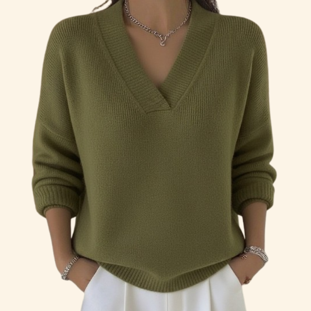 Pull Noor Danoir Paris en laine confortable et élégant, couleur neutre, porté sur mannequin, détail du col rond et manches longues.