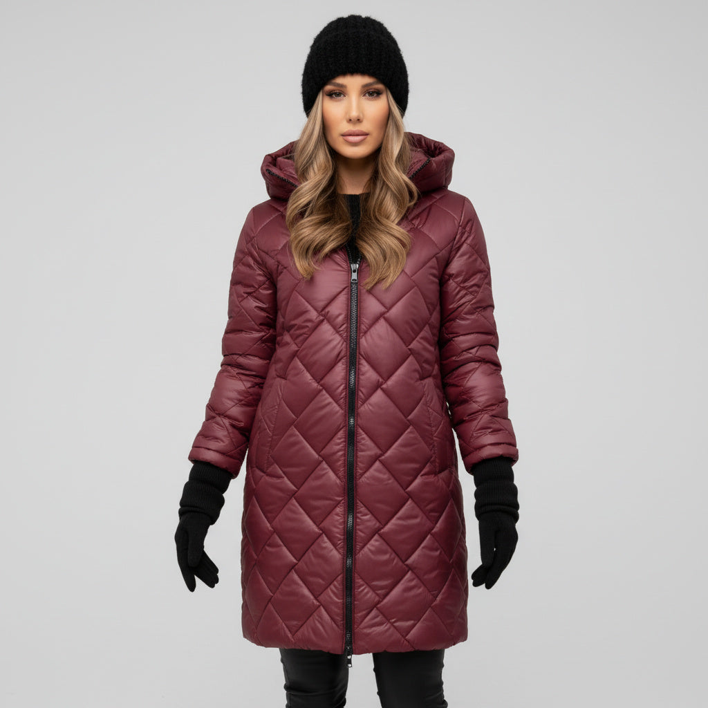 Veste chaude et élégante Bogna de Danoir Paris en rose poudré, style sophistiqué et confort pour l'hiver.