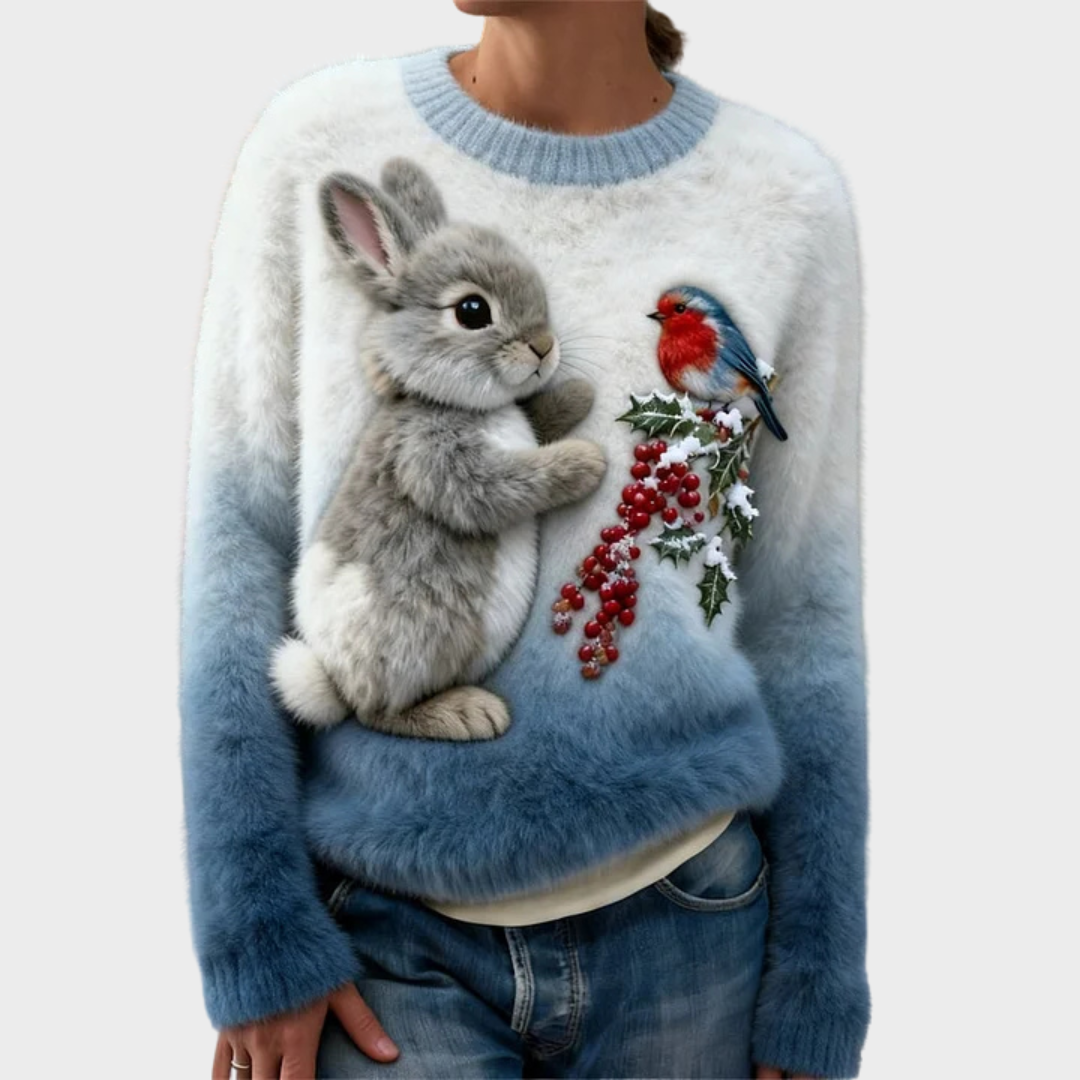 Pull en peluche festif Luna de Danoir Paris, doux, chaud avec motifs colorés, idéal pour l'hiver et les fêtes.