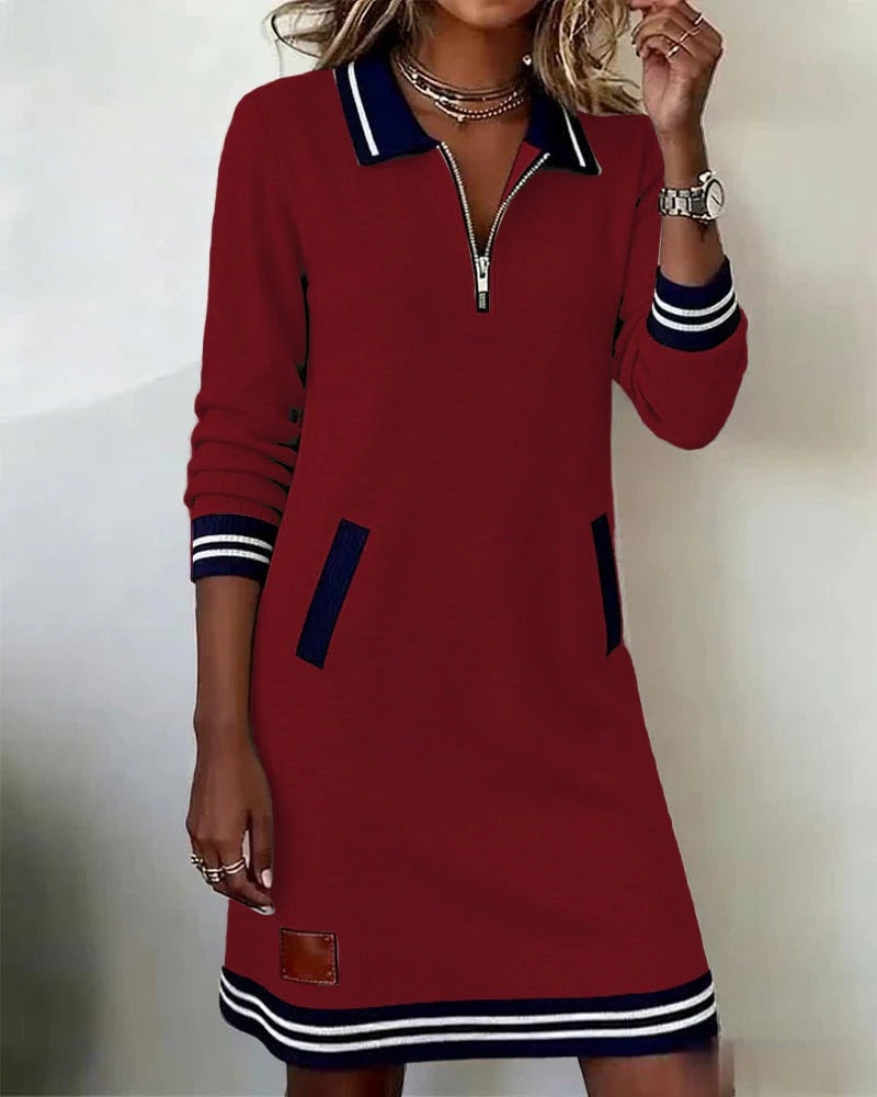 Robe Sporty-Chic Élégante Danoir Paris, modèle FR1373, en tissu fluide avec détails modernes, portée en occasion décontractée ou élégante.