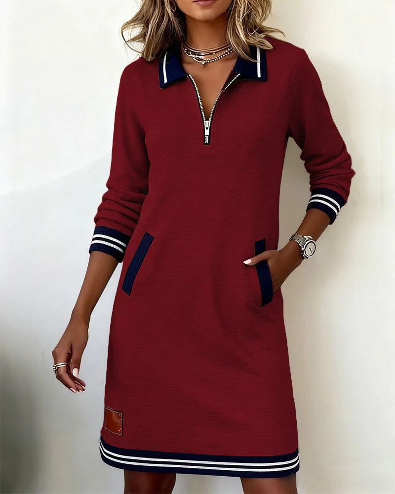 Robe Sporty-Chic Élégante Nadege Danoir Paris, tissu léger avec détails modernes, portée décontractée élégante.