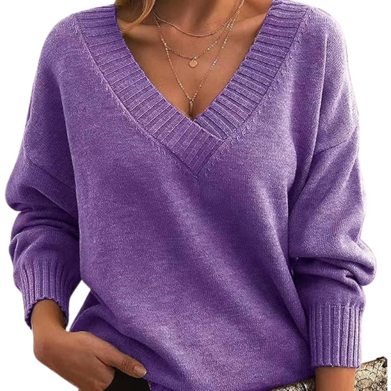 Pull en cachemire Danoir Paris Chic, couleur abricot, coupe élégante, détails sophistiqués, idéal pour un style chic et confort.