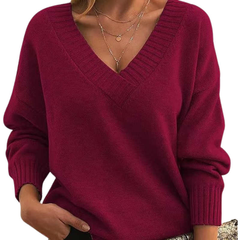 Pull en cachemire élégant Danoir Paris, couleur abricot, avec col rond et finition fine, porté sur mannequin.
