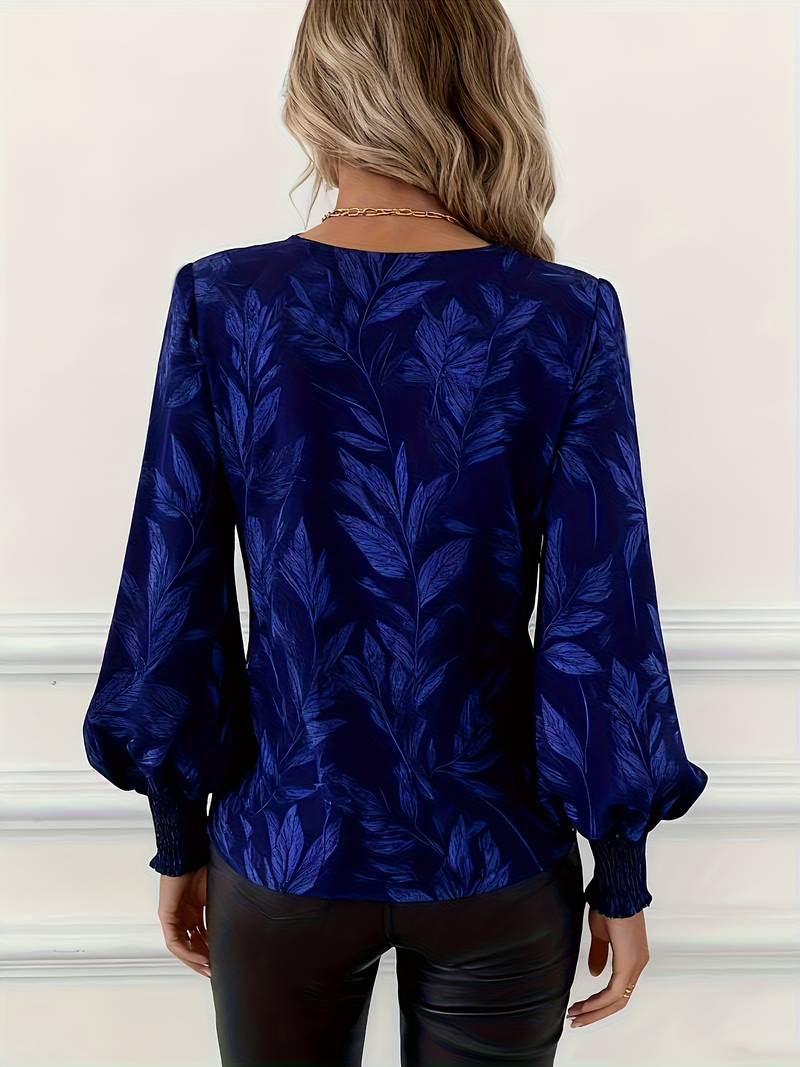 Blouse élégante Ruchama à imprimé feuilles de Danoir Paris, design féminin avec motif végétal, en tissu léger et fluide.