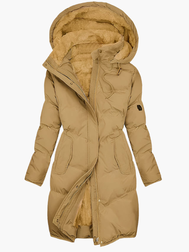 Manteau hivernal élégant Olivia de Danoir Paris en vert, coupe sophistiquée et tissu chaud, pour un style chic et confortable.