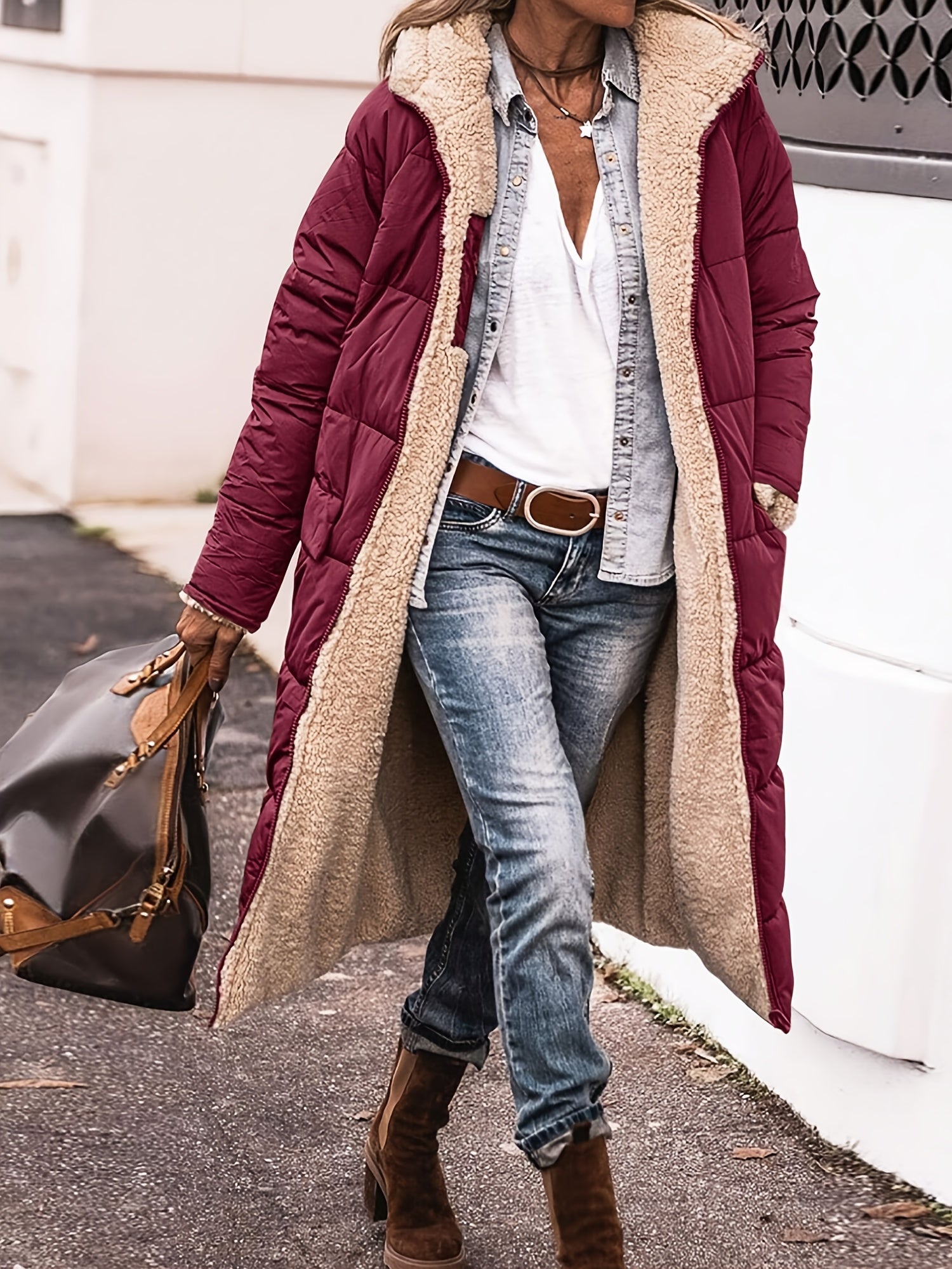 Manteau d'hiver noir Amelia de Danoir Paris, style chic et élégant, avec détails sophistiqués, pour femmes.