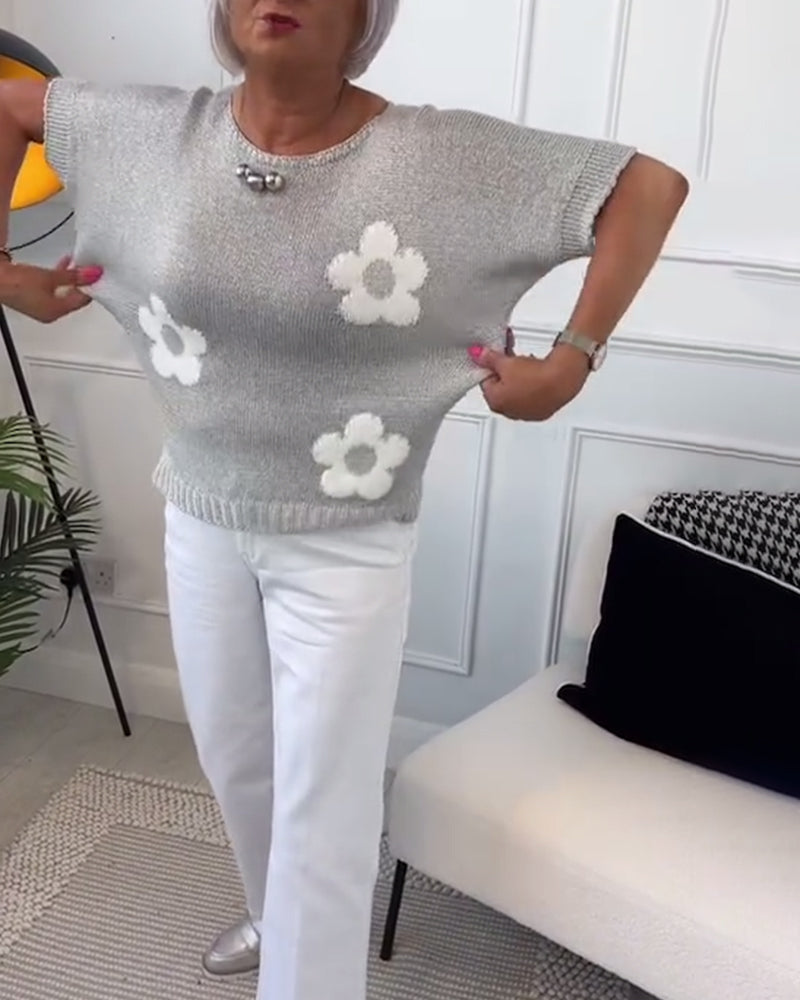 Pull floral élégant Daisy FR906 de Danoir Paris, en laine douce avec motifs floraux colorés, porté sur un mannequin.
