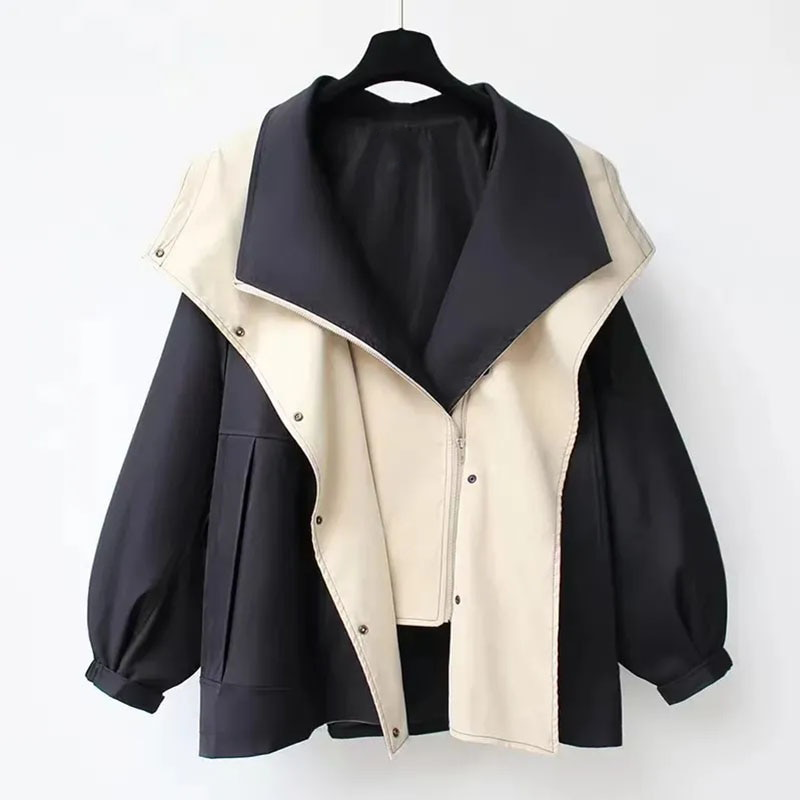 Veste élégante anti-pluie blanc Danoir Paris FR907, coupe moderne et matériau imperméable visible sur cette image.
