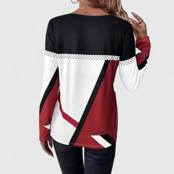 Top graphique moderne Lena en FR925 de Danoir Paris, vue en gros plan sur le design et la texture du bijou en argent.