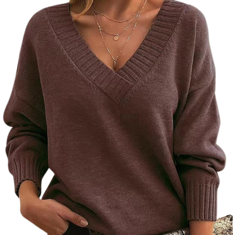 Pull élégant en mélange de cachemire Lenia de Danoir Paris, couleur abricot, avec un design raffiné et confortable.