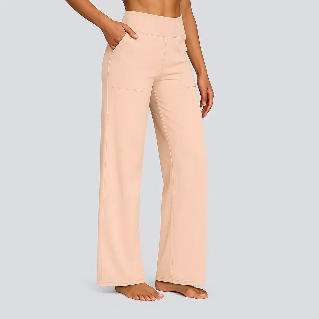 Pantalon stretch confortable Enora de Danoir Paris en couleur abricot, coupe ajustée et tissu doux, pour un style décontracté.