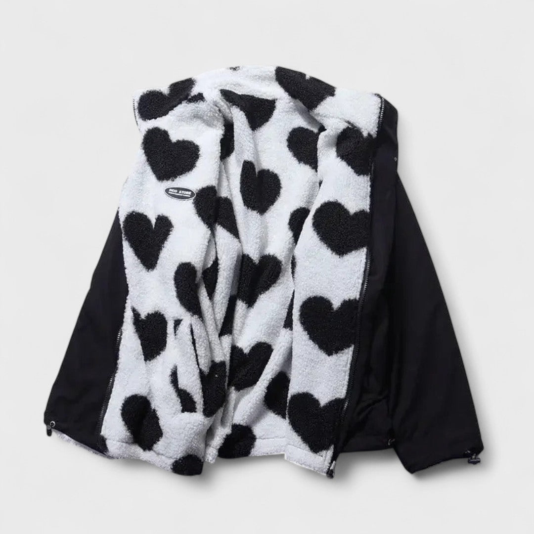 Veste réversible élégante Katharina de Danoir Paris, en noir, avec détails sophistiqués, vue de face sur fond blanc.