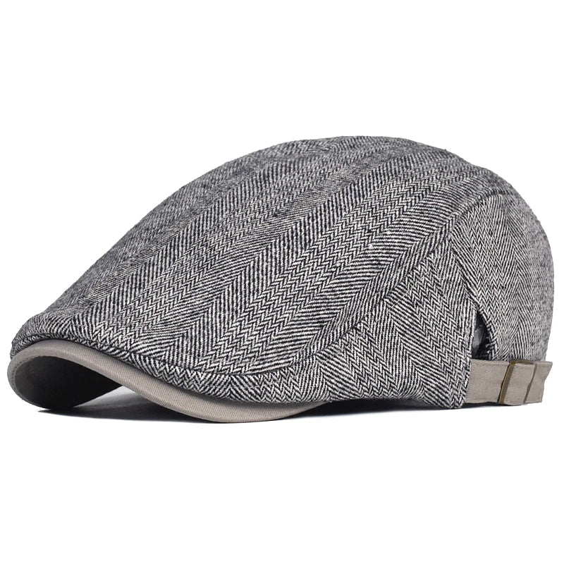Chapeau homme gris Bloom™ de Danoir Paris, style premium, avec bande décorative, porté sur une tête.