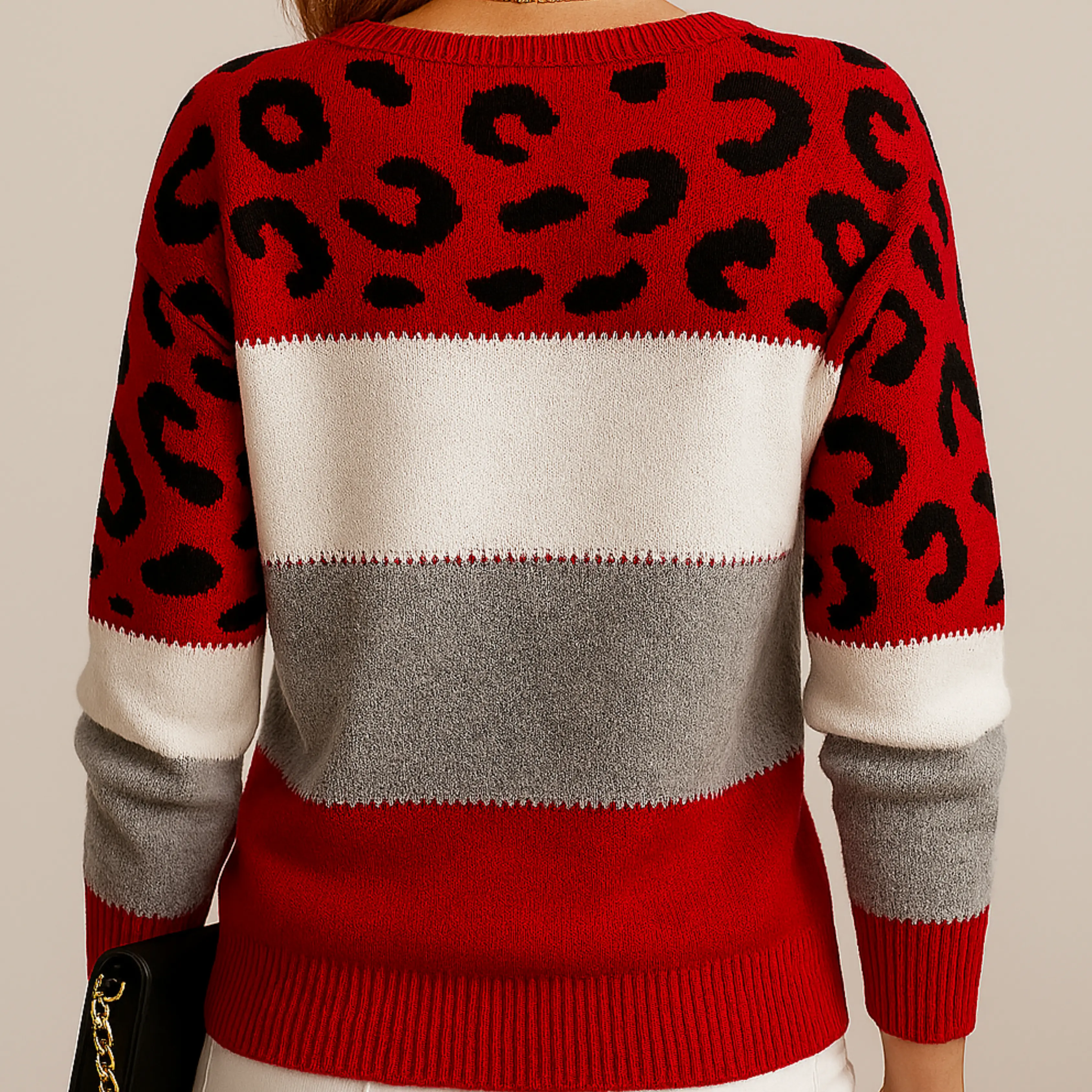 Pull en maille élégante à motif léopard Danoir Paris, coupe confortable et imprimé chic pour un look tendance.