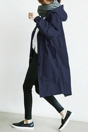 Manteau trench élégant Danoir Paris Mandy gris déperlant, coupe classique avec ceinture et détails sophistiqués.