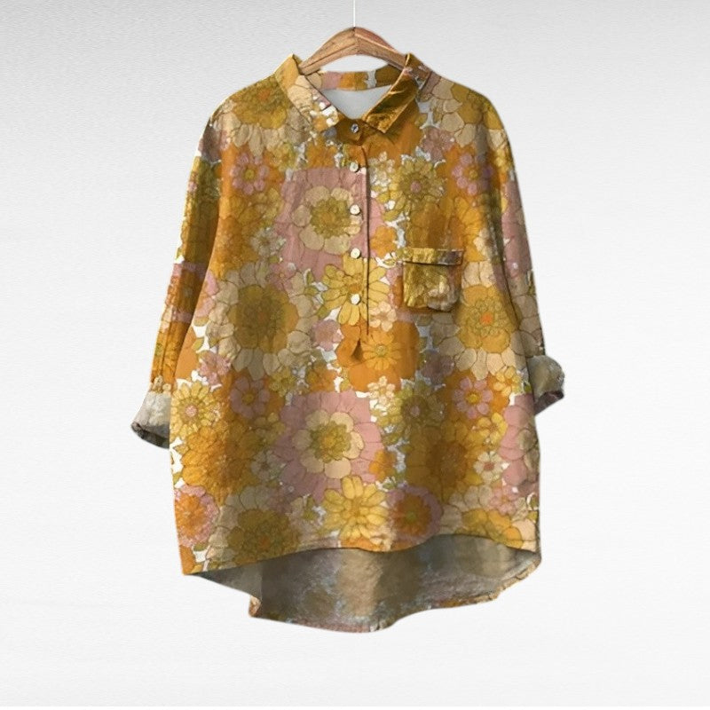 Chemise fleurie rétro Marjolaine de Danoir Paris, tissu léger avec motif floral coloré, portée élégante et vintage.