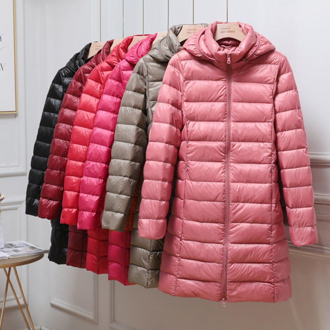 Doudoune chaude et élégante Aire de Danoir Paris en kaki, veste chic pour l'hiver, visible avec col rembourré et fermeture zippée.