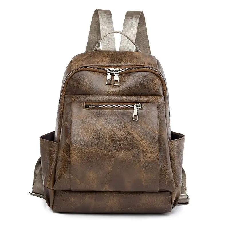 Sac à dos marron Cordelia de Danoir Paris, sac à main chic et intemporel avec poignée en cuir et détails élégants.