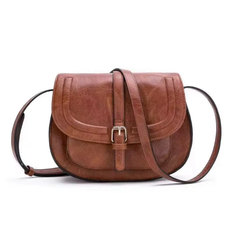 Sac à main Sienna Danoir Paris en cuir marron foncé, design intemporel et élégant, vue de face avec poignées.