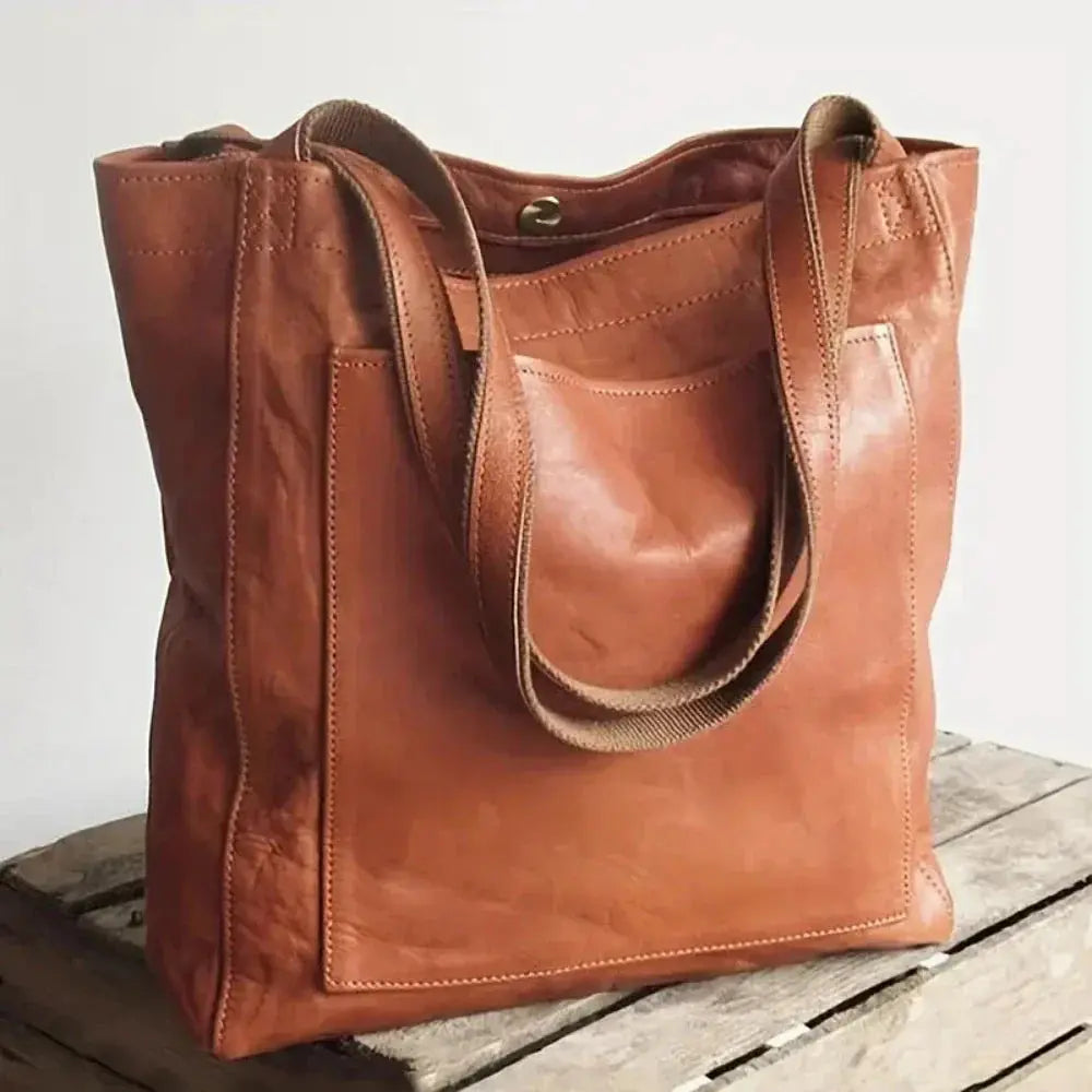 Sac de ville élégant Lila de Danoir Paris, en marron avec détails sophistiqués, idéal pour une allure chic et moderne.