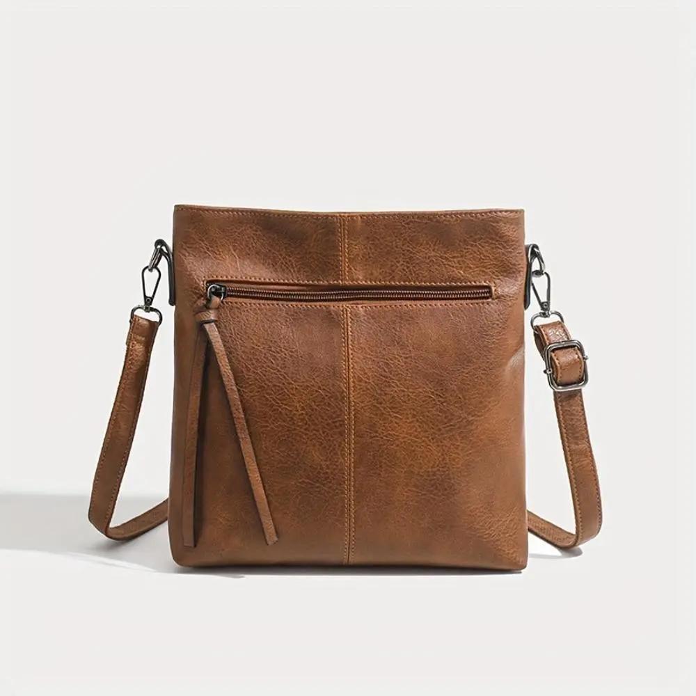 Sac à bandoulière vintage Lina de Danoir Paris avec motif échiquier marron, accessoire élégant en cuir.