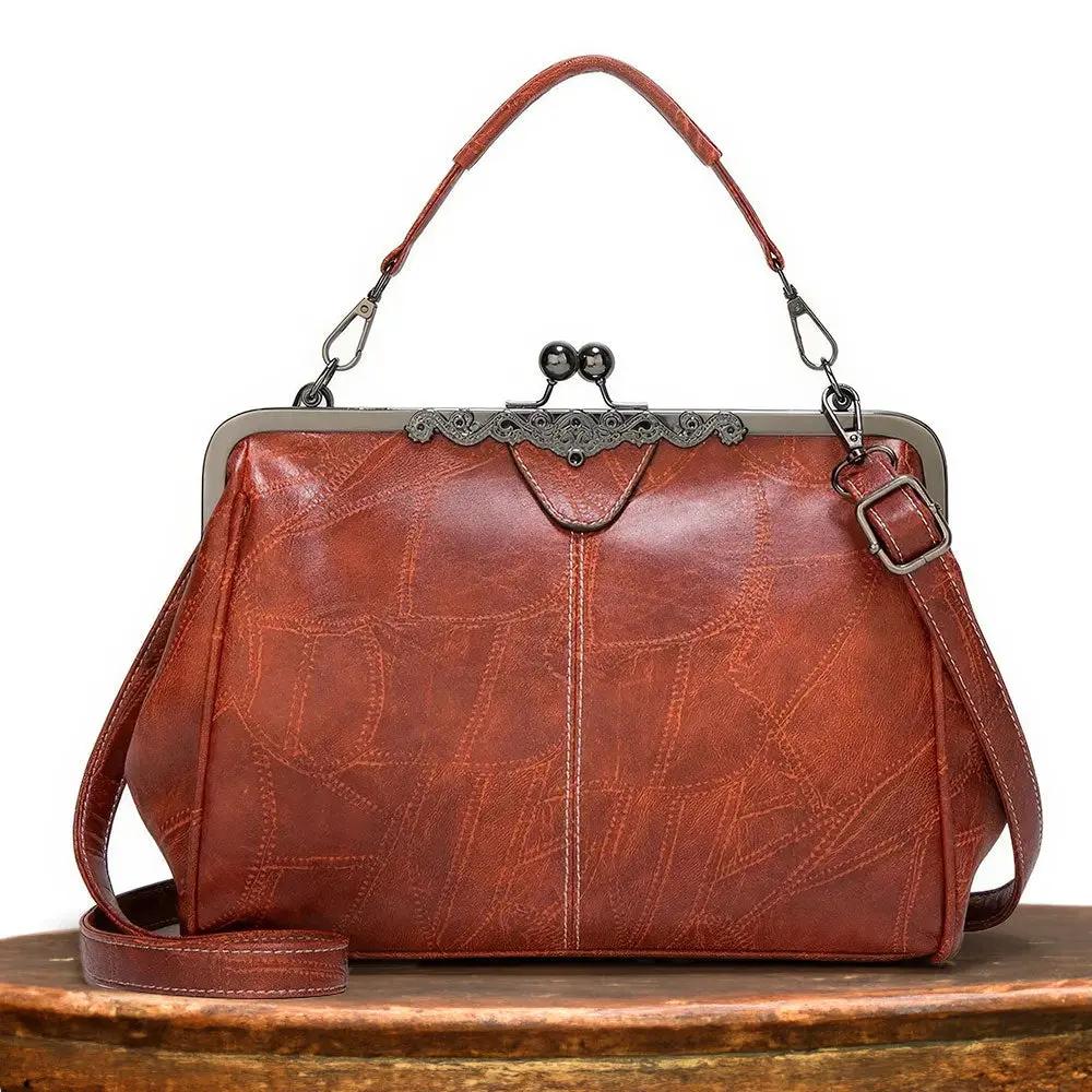 Sac à main vintage Danoir Paris Lorelei en cuir marron élégant au charme intemporel, avec poches et détails raffinés.