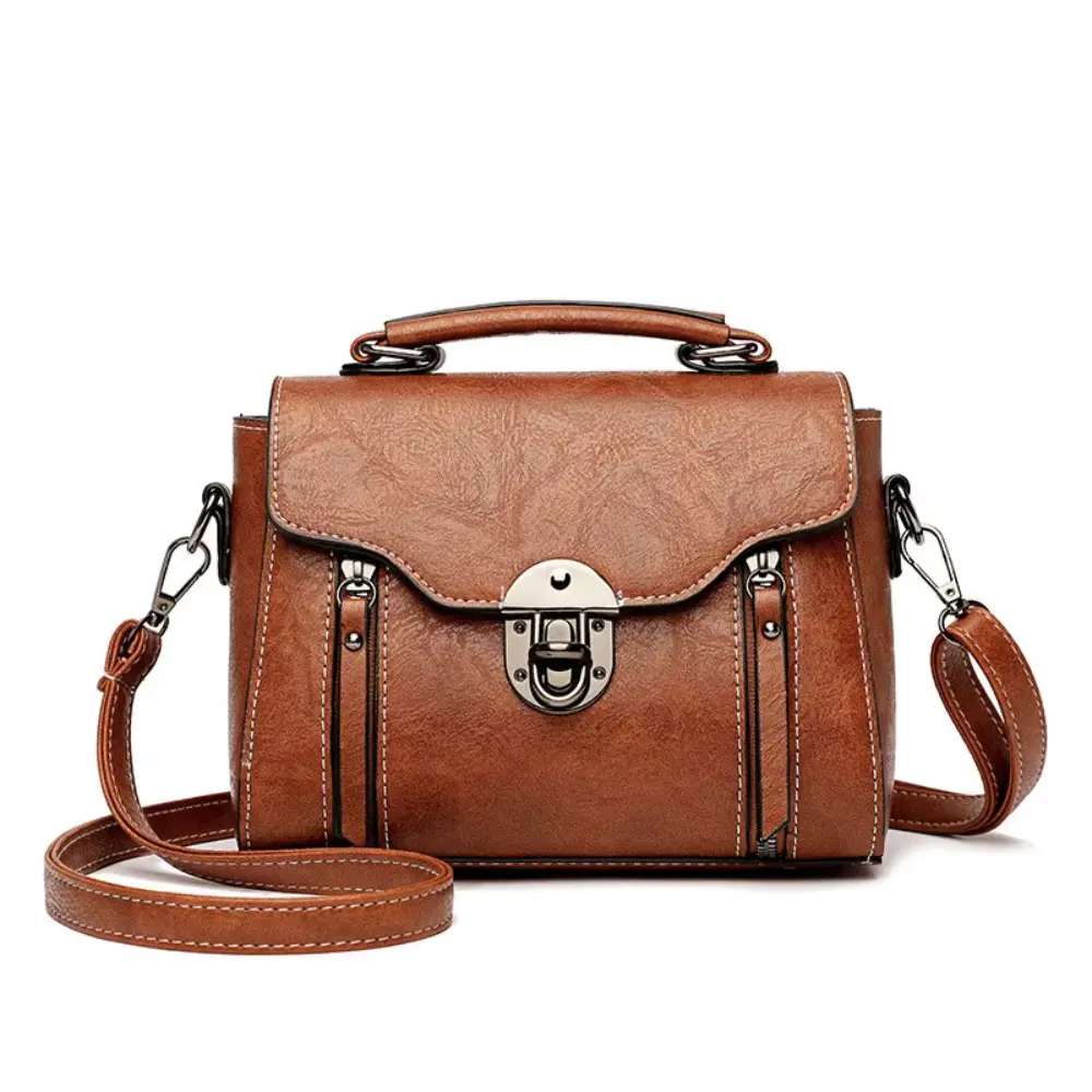 Sac à main rétro-chic Luna de Danoir Paris en marron, avec design élégant et détails sophistiqués pour un style intemporel.
