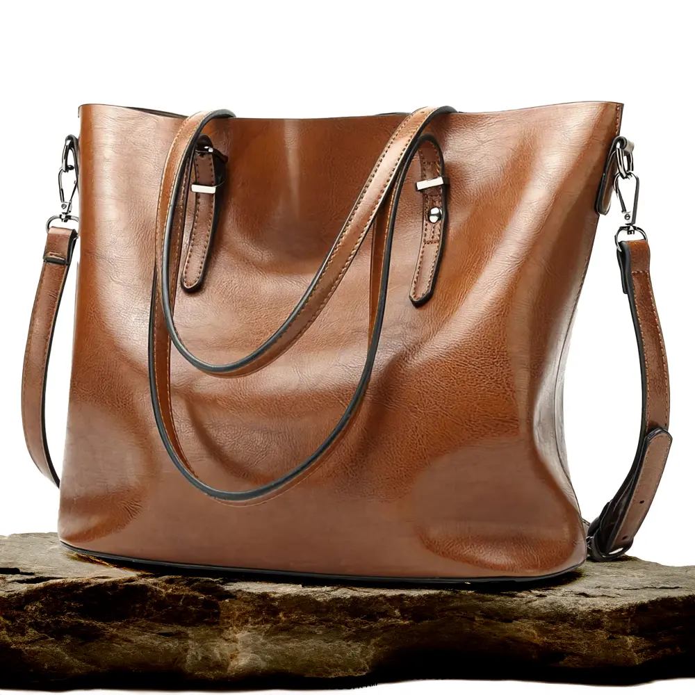Sac à bandoulière vintage marron Nicole de Danoir Paris, sac à main élégant et intemporel en cuir.