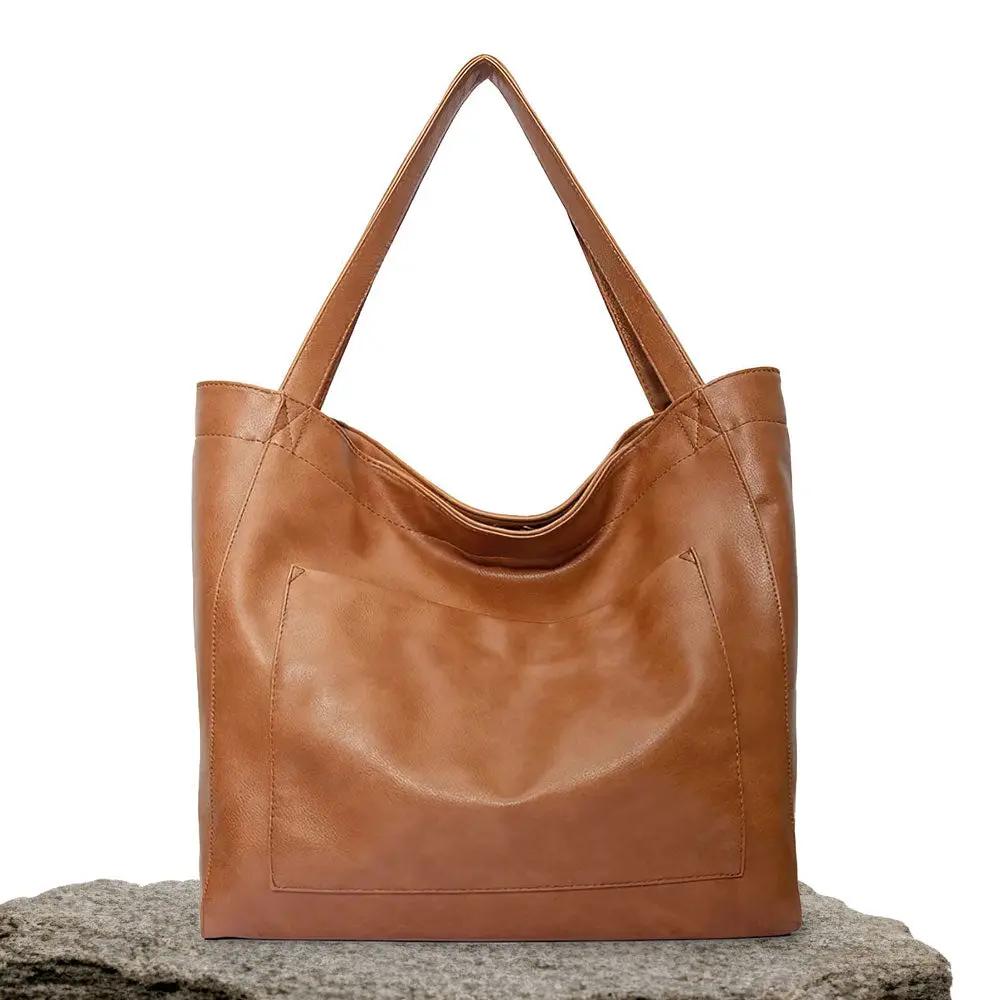 Sac à bandoulière Danoir Paris Ringelblume en matériau doux marron, sac à la mode et élégant, vue de face.