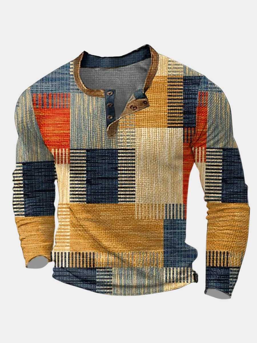 Chemise patchwork colorée pour homme de la marque Danoir Paris, en tissu multicolore avec col et boutons visibles.