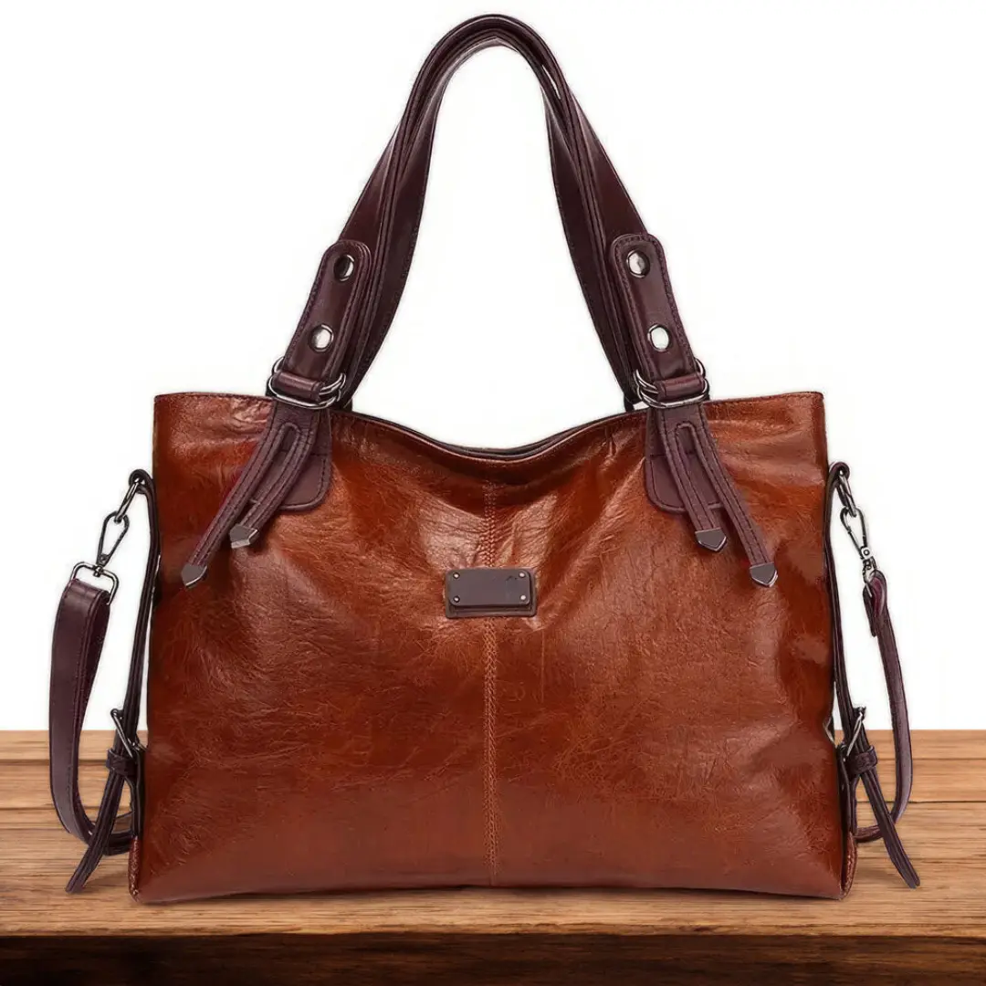 Sac de voyage Sienna Danoir Paris en marron, sac de voyage Voyager Intemporel avec poignées robustes et design élégant.
