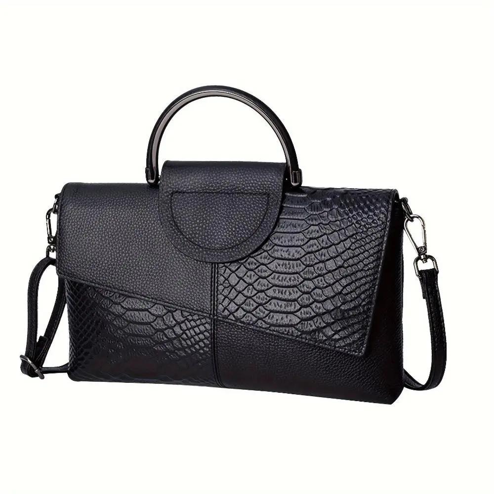 Sac à main Danoir Paris Cassandra avec motif crocodile opulent, sac élégant en cuir noir et détails sophistiqués.
