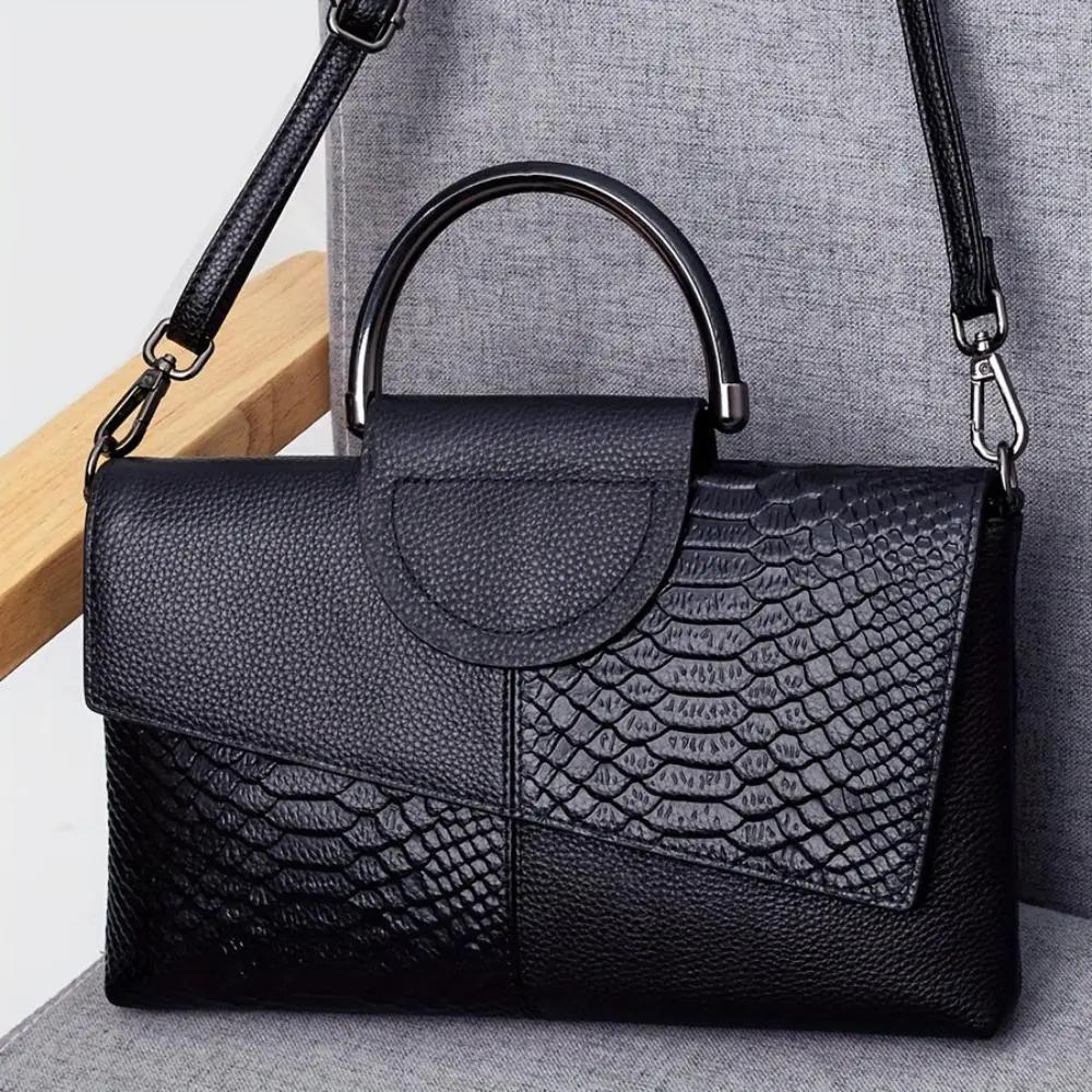 Sac à main Danoir Paris Cassandra avec motif crocodile opulent, finition élégante et design sophistiqué pour femmes.
