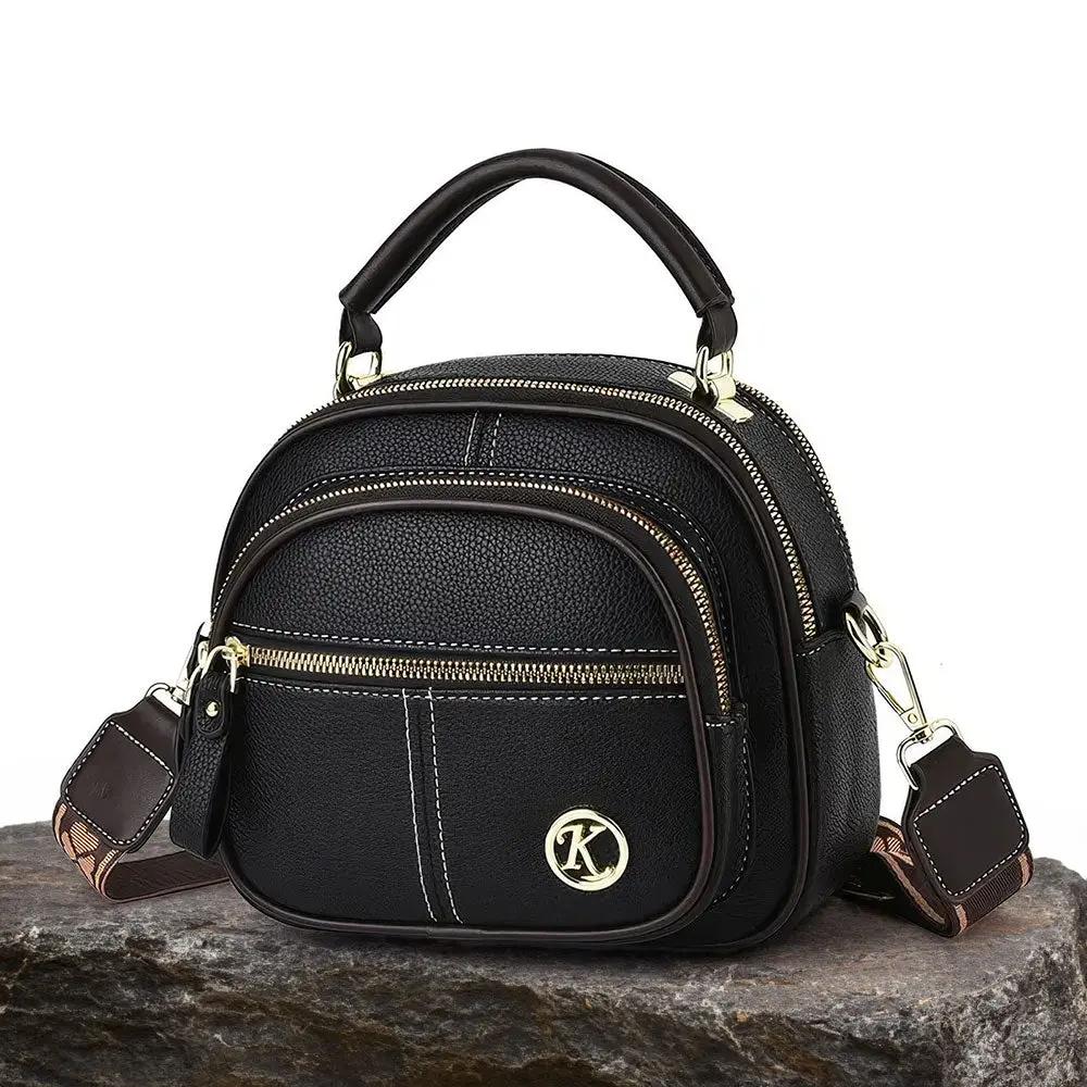 Sac à bandoulière Fiona de Danoir Paris, sac chic classique en noir avec finition élégante et design sophistiqué.