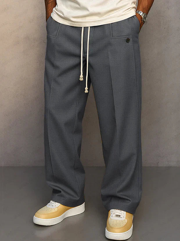 Pantalon élégant Danoir Paris Didier noir avec cordon ajustable, coupe moderne et détails sophistiqués, porté sur mannequin.